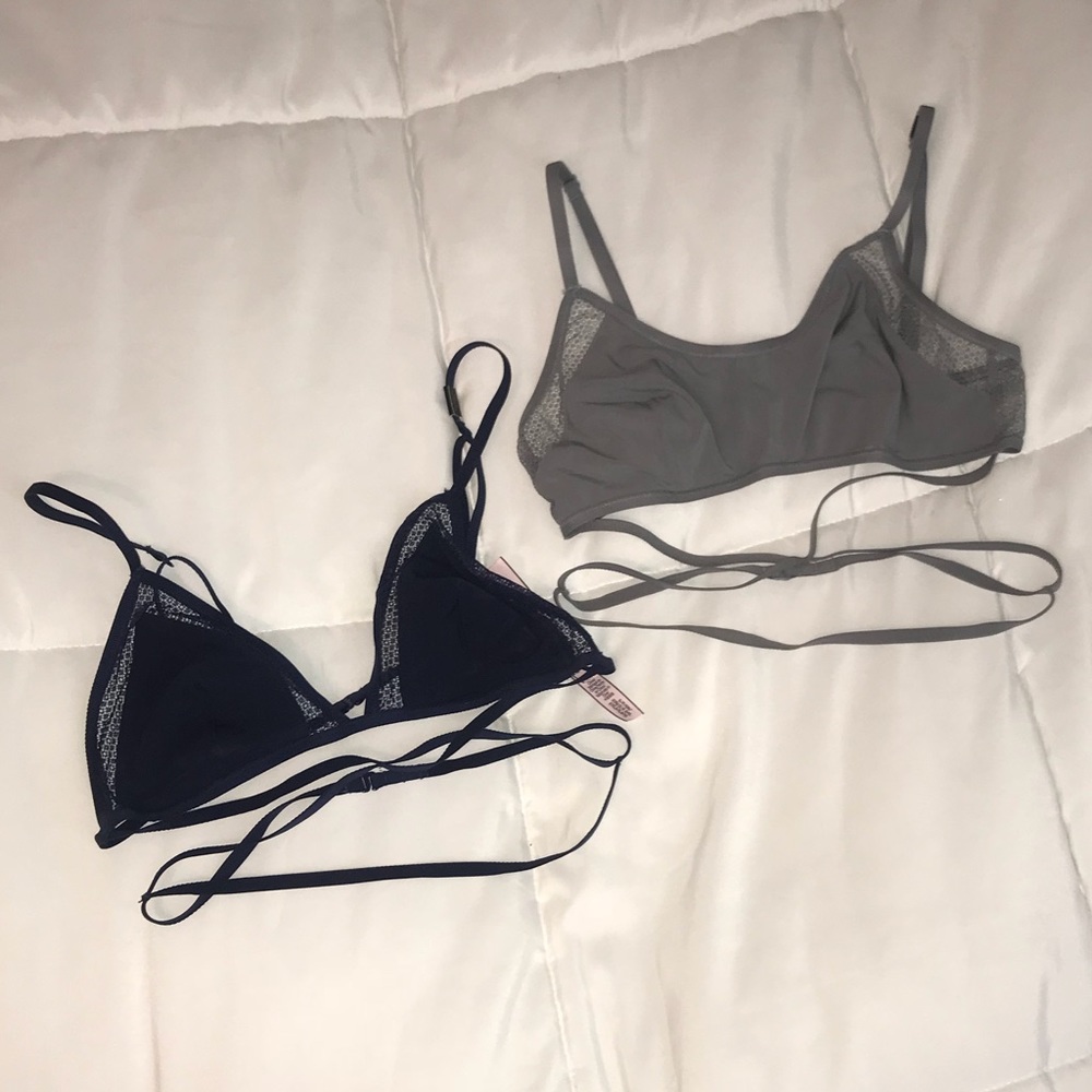 Two Victoria’s Secret body wrap bralettes.